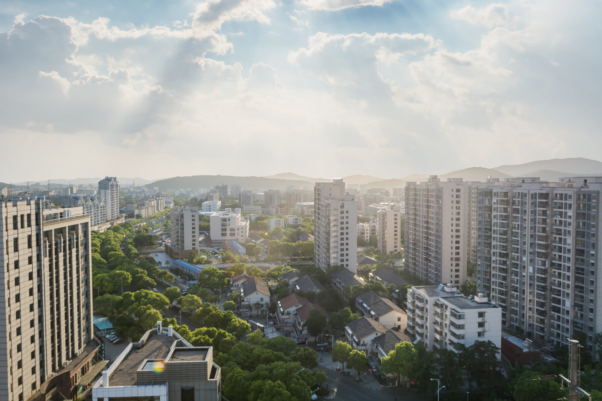 a city with many buildings and trees